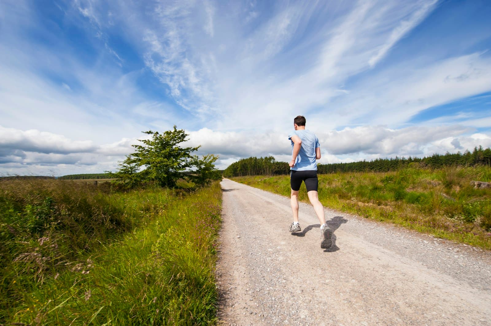 Everyday runner on a local road focusing on a practical workout