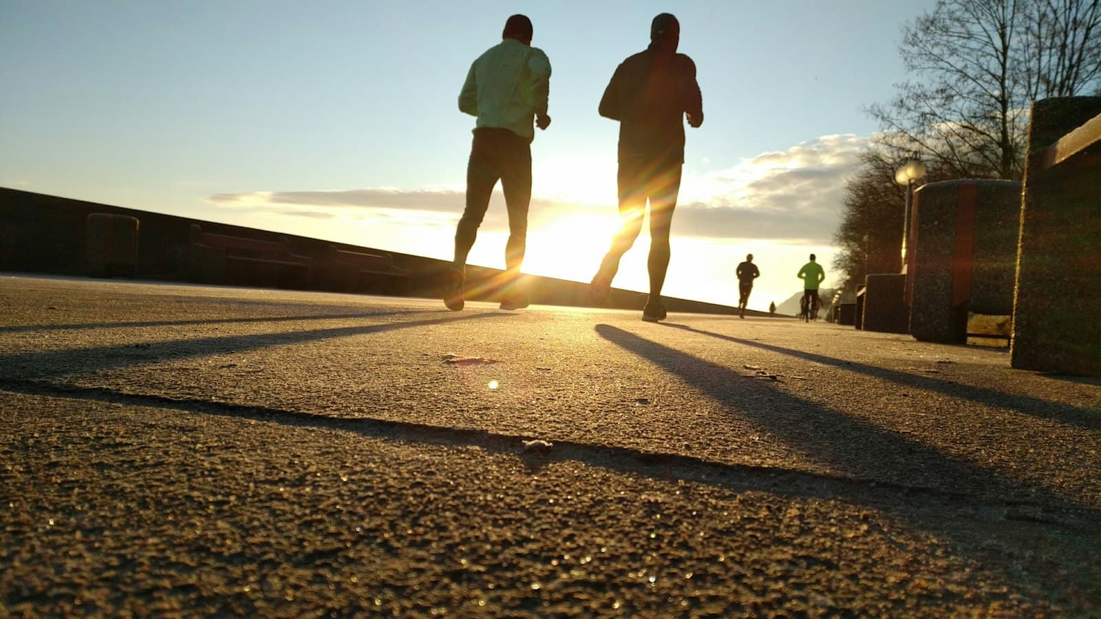 Close view of running shoes on pavement during an easy outdoor run