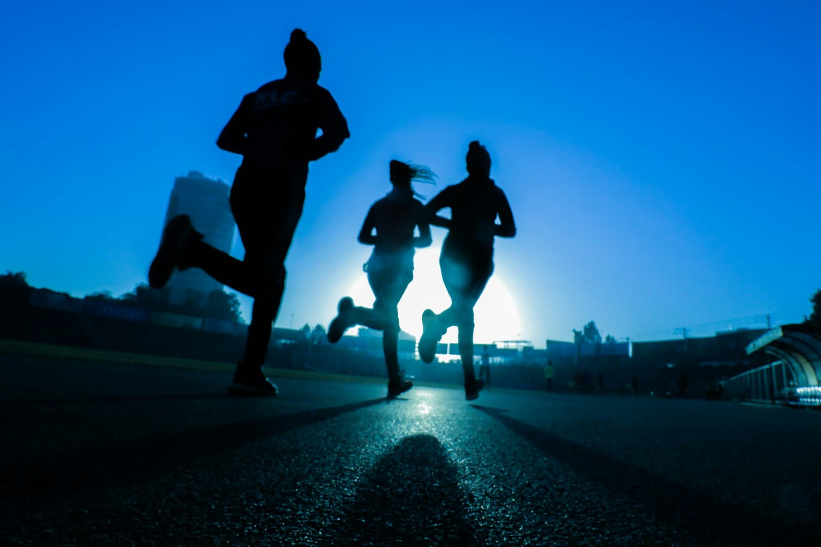 Person walking and jogging along an outdoor path